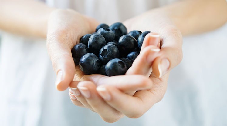 woman-holding-berries_sm
